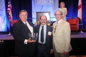 Man receiving an award.